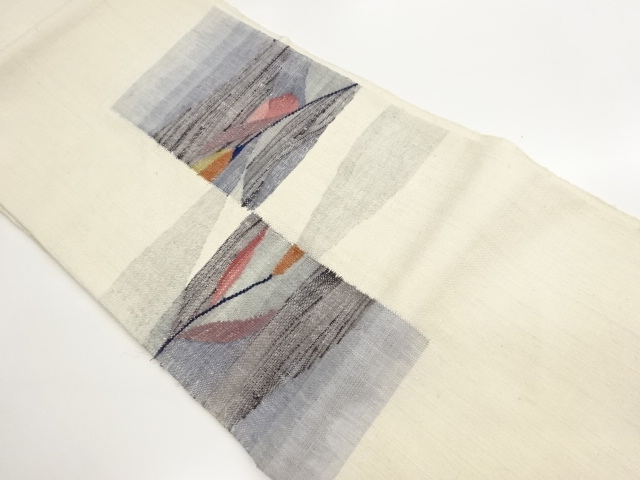 手織り紬すくい織色紙に抽象模様織出し名古屋帯